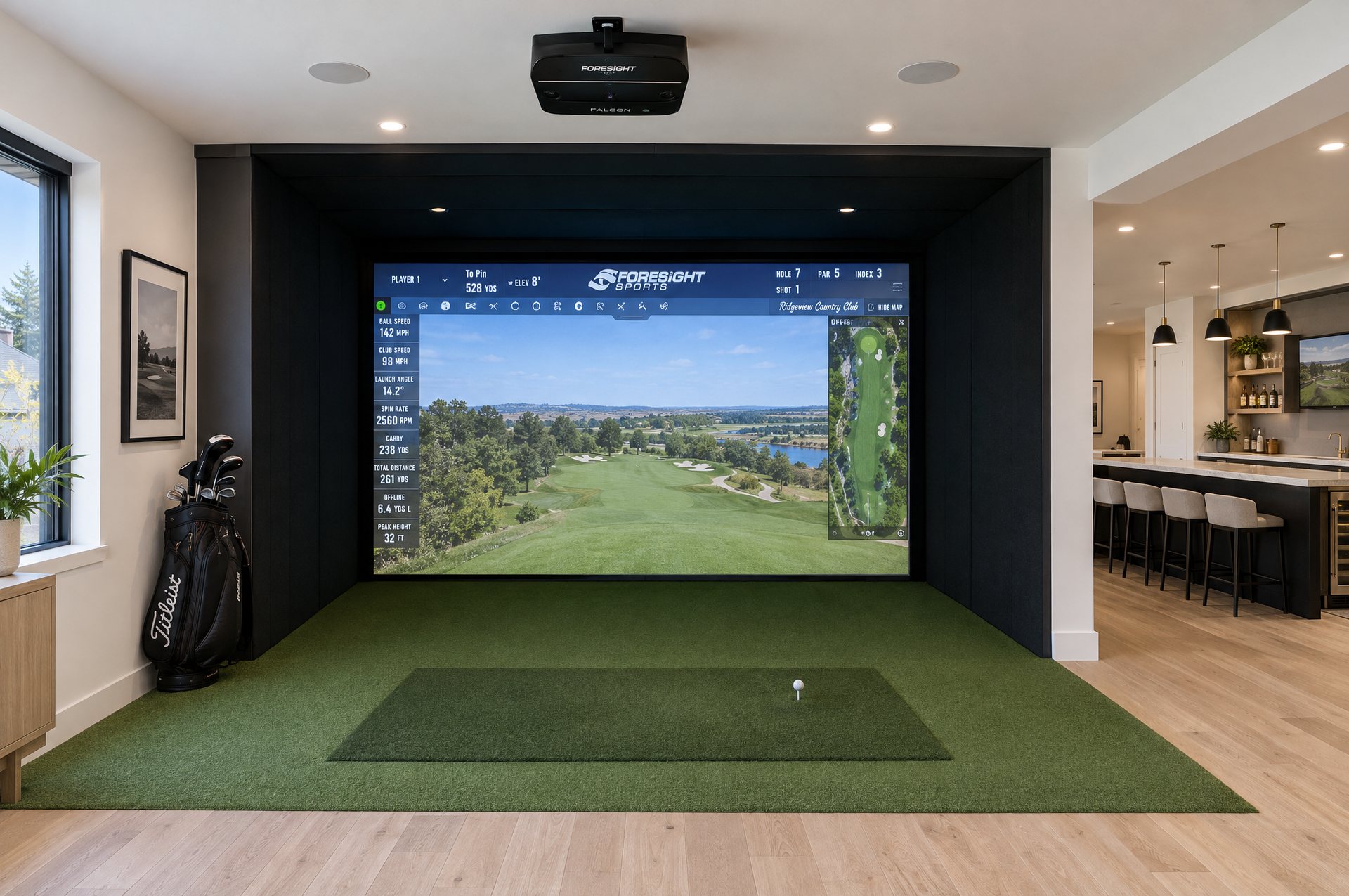 An illustration of a golf simulator bay: a Foresight Falcon launch monitor on the ceiling above the hitting mat, the impact screen in a black enclosure, turf, and in-ceiling speakers.